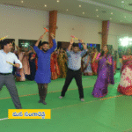 Sangareddy district police officers, staff, and officials celebrating Bathukamma festival at LN Convention Hall with cultural traditions.