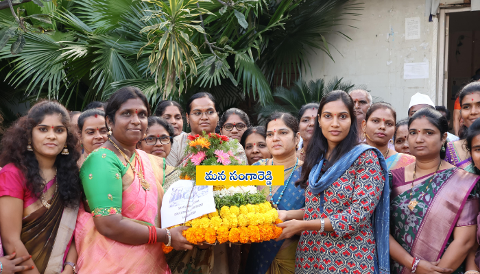 Second day of Bathukamma Festival celebrations at Sangareddy Collectorate with women employees, teachers, and students participating in traditional songs and dances.
