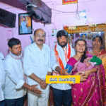 Sangareddy MLA Chintha Prabhakar and his son Chintha Sainath blessing the newborn during the traditional Tottela ceremony at Kambalapally village, Sadashivpet mandal