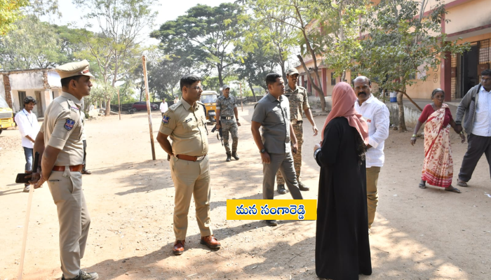 Sangareddy SP Paritosh Pankaj inspecting polling stations at Turkpally and Nizampet during local body elections in Narayankhed constituency